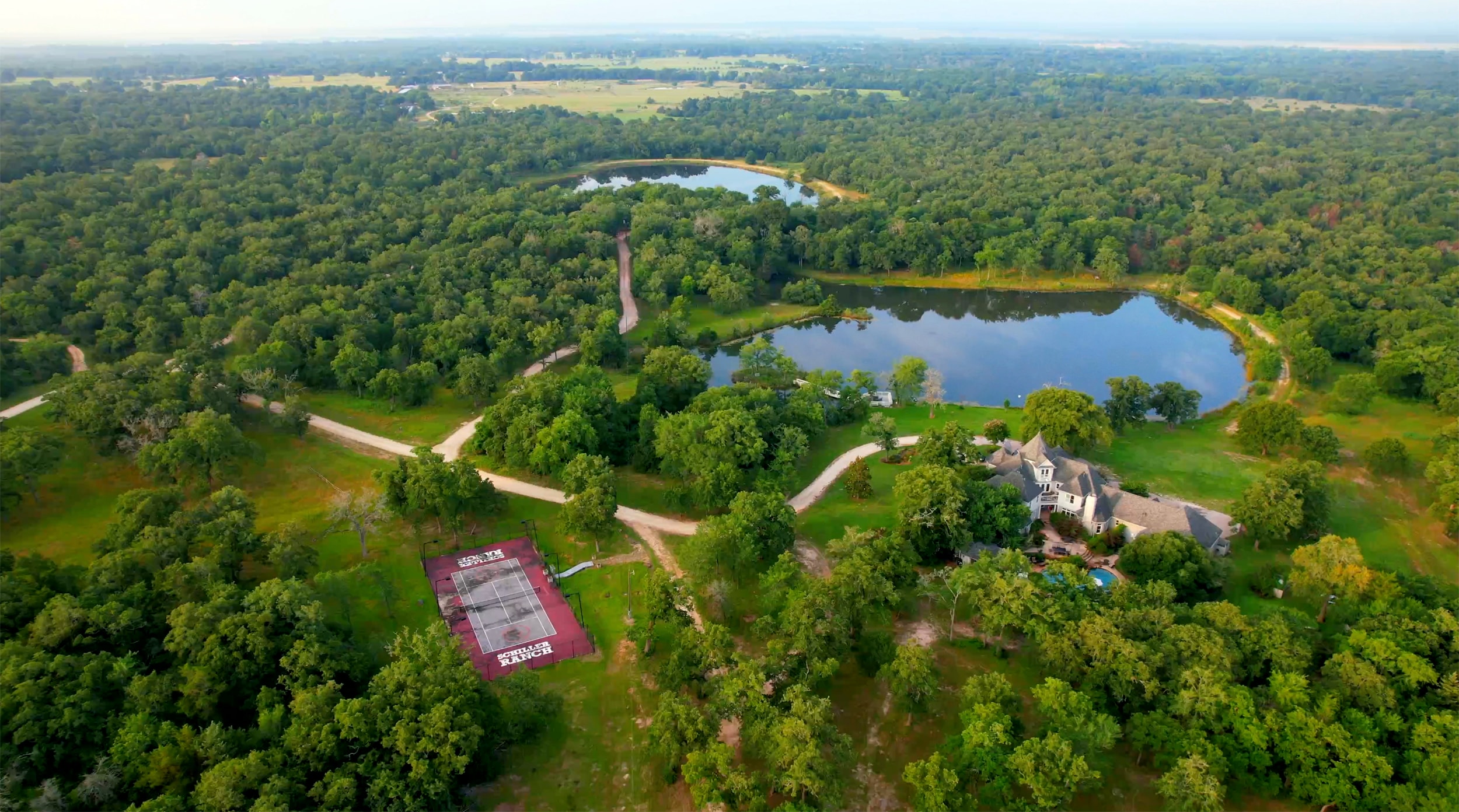 Red barn equestrian property aerial